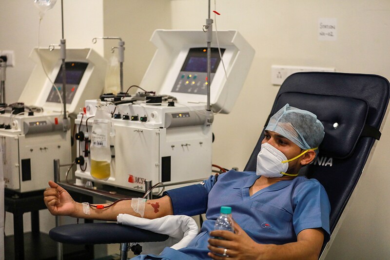 A plasma donor is seen at the newly inaugurated plasma bank at the state-run Institute of Liver and Biliary Sciences (ILBS) hospital for treatment of patients suffering from the coronavirus disease (COVID-19), amidst the spread of the disease in New Delhi, India, July 2, 2020.