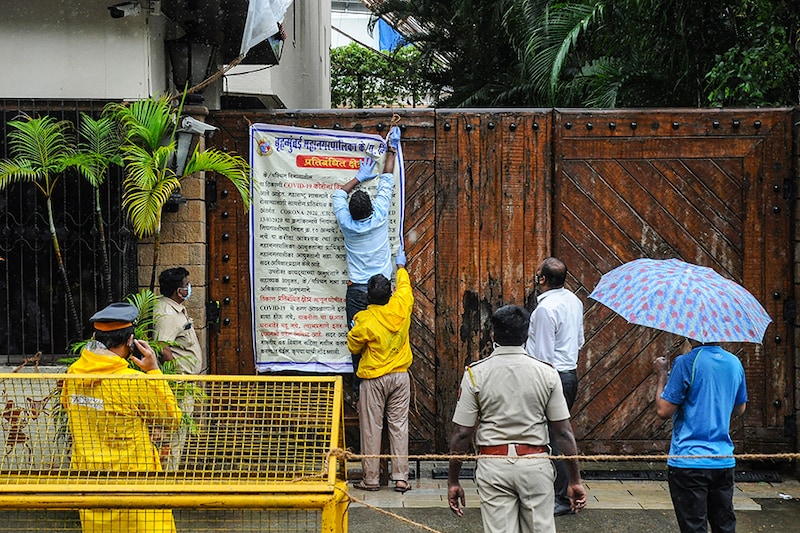 Municipal workers put up a notice on Bollywood actor Amitabh Bachchan"s bungalow gate. He tested positive for coronavirus and has been admitted to a hospital where he is being kept in quarantine. Members of his family including Abhishek, Aishwarya and grand-daughter Aaradhya have also contracted the virus. The actor requested those who had come in close proximity in the past ten days to get themselves tested for the virus.