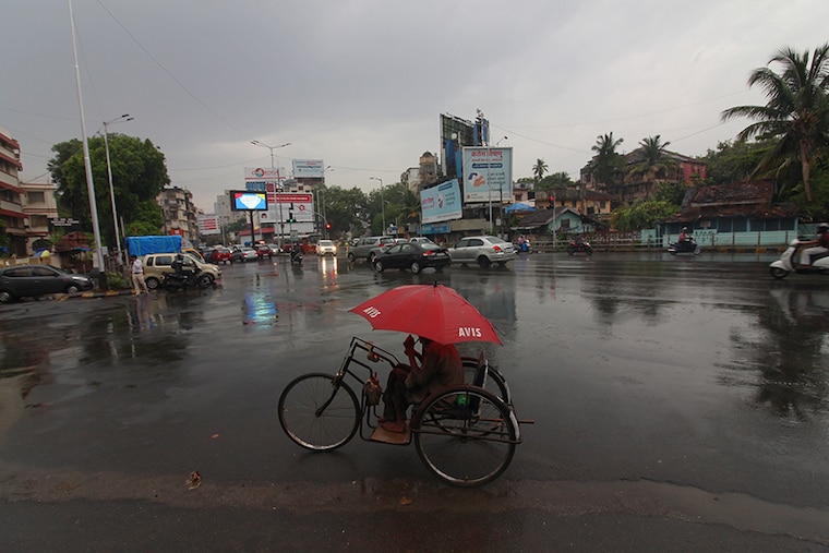 A disabled man rides his wheelchair in Mumbai, India on June 02, 2020. Tropical cyclone storm "Nisarga" expected to hit the Maharashtra coast on June 03 as per media report