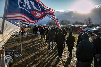 Supporters of U.S. President Donald Trump arrive to a Trump campaign rally on November 01, 2020 in Washington, Michigan. Only days before the U.S. election, President Trump and Democratic nominee Joe Biden are campaigning in crucial swing states.