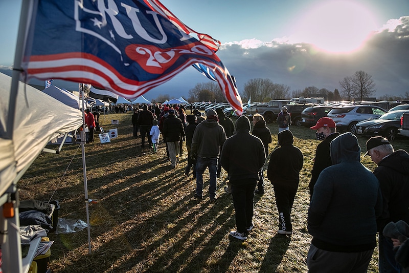 Supporters of U.S. President Donald Trump arrive to a Trump campaign rally on November 01, 2020 in Washington, Michigan. Only days before the U.S. election, President Trump and Democratic nominee Joe Biden are campaigning in crucial swing states.