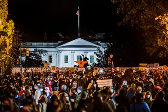 People fill Black Lives Matter Plaza near the White House in Washington, on Election Day, Tuesday, Nov. 3, 2020.