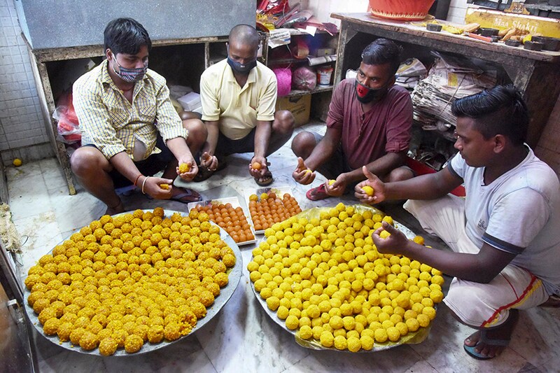 Preparations at RJD Party for celebrations ahead of Bihar Assembly results. Workers preparing ladoos on the eve of assembly election results on November 9 in Patna, India.