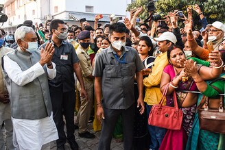 Bihar Chief Minister Nitish Kumar gestures at his supporters upon his arrival at the party headquarters, two days after the Bihar Assembly election results were declared, on November 12, 2020 in Patna, India.