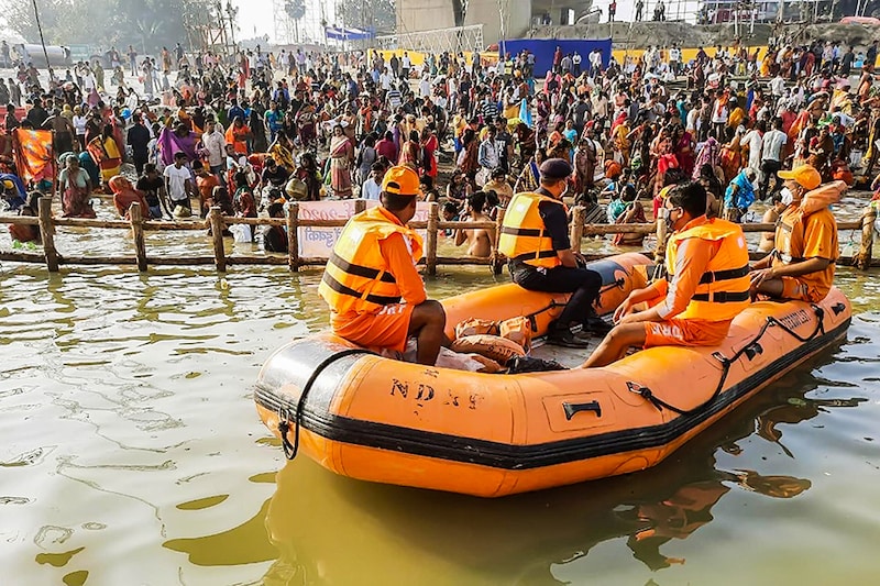 An NDRF team in a boat monitors Chhath celebrations by the banks of the river Ganga, at Gandhi Ghat on November 18, 2020 in Patna, India.