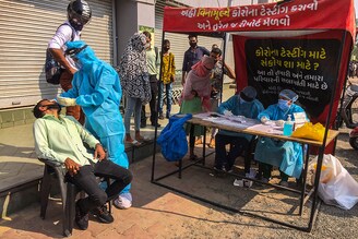 Ahmedabad Municipal corporation undertaking the rapid antigen Covid-19 test on November 20, while the Gujarat government has announced a complete curfew in the city until Monday, amidst a rise of coronavirus cases. Only shops selling milk and medicines will remain open. After Monday, a night curfew is expected to persist.