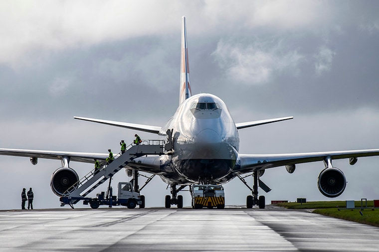 British Airways crew depart a Boeing 747-400 (G-CIVY) aircraft for the last time after it arrives at St. Athan airport on October 8, 2020 in St. Athan, Wales. The aircraft has clocked-up 45 million air miles having first flown in September 1998. Two Heathrow-based Boeing 747 aircraft set off for their last flights, one to Kemble airport and the other to an airfield near Cardiff. British airways have brought forward the jumbo jets retirement by several years due to the financial impact of the Coronavirus pandemic on the airline.