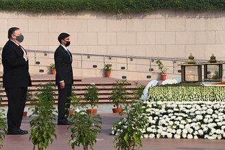 U.S. Secretary of State Mike Pompeo and U.S. Secretary of Defence Mark Esper pay respects after laying wreaths at the National War Memorial in New Delhi, India on October 27.