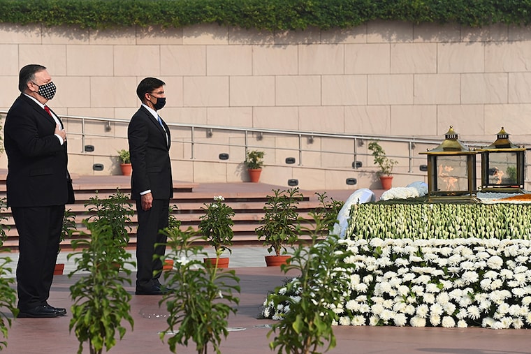 U.S. Secretary of State Mike Pompeo and U.S. Secretary of Defence Mark Esper pay respects after laying wreaths at the National War Memorial in New Delhi, India on October 27.