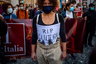 Theater workers, dancers and people working in the culture and entertainment sector attend a protest against the new lockdown measures for Covid-19 pandemic, on October 30, 2020 in Rome, Italy. The protest is organized to protest against the government restriction measures of closing cinemas, movie theaters and gyms to contain the spread of coronavirus (Covid-19) pandemic. Italy registered over 26,800 new infections and 217 deaths in the last 24 hours.