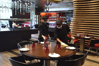 Employees sanitise the hotel premises, at Le Meridien Hotel ahead of its reopening in Unlock 4.0, on August 31, 2020 in New Delhi, India.