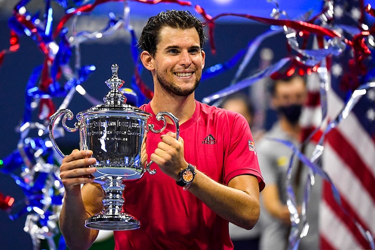 Dominic Thiem of Austria celebrates with the championship trophy after his match against Alexander Zverev of Germany (not pictured) in the men"s singles final match on day fourteen of the 2020 U.S. Open tennis tournament at USTA Billie Jean King National Tennis Center.