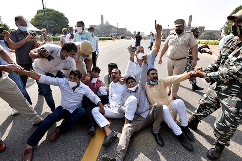 Congress party workers protest against the Hathras gang-rape case, at Vijay Chowk near Parliament House, on September 29, 2020 in New Delhi, India. The Opposition party"s attack on the Centre and the UP government came after a 19-year-old Dalit woman from Hathras died at Safdarjung hospital in Delhi Tuesday morning, days after she was allegedly raped by four men.