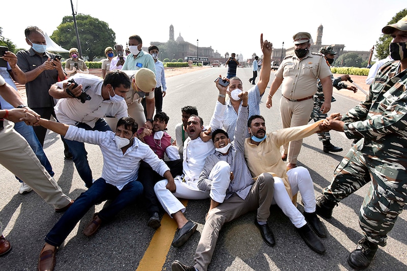 Congress party workers protest against the Hathras gang-rape case, at Vijay Chowk near Parliament House, on September 29, 2020 in New Delhi, India. The Opposition party"s attack on the Centre and the UP government came after a 19-year-old Dalit woman from Hathras died at Safdarjung hospital in Delhi Tuesday morning, days after she was allegedly raped by four men.