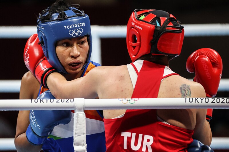 Lovlina Borgohain (in blue) settled for a bronze medal as she lost to reigning world champion Busenaz Surmeneli of Turkey in the women’s welterweight semi-final boxing match during the Tokyo 2020 Olympic Games at the Kokugikan Arena in Tokyo on August 4, 2021. Lovlina Borgohain is the first Olympics medallist from Assam and the only boxing medal winner for India in Tokyo 2020