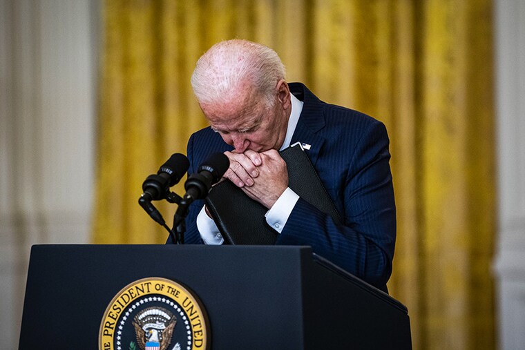 US President Joe Biden pauses while speaking in the East Room of the White House in Washington, DC, US, on Thursday, Aug. 26, 2021. Biden vowed to continue evacuations from Afghanistan after explosions in Kabul killed 13 US service members, and said the US will retaliate against those responsible for the bombings.