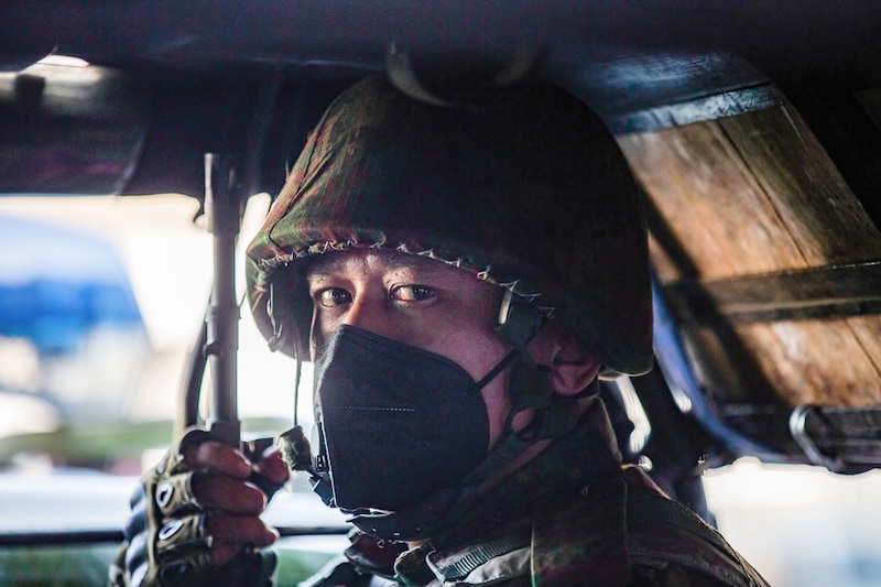 A soldier watches from a military truck parked outside Yangon Hindu temple, Myanmar. Myanmar’s powerful military have declared a state of emergency for a year, detained State Counsellor Aung San Suu Kyi and taken power in their hands. Myanmar, which started a fragile transition to democracy 10 years ago after decades of brutal military dictatorship, is back in the hands of the Generals.