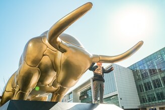 A gold-colored bull statue is seen at Beijing Financial Street on the fifth day of the Chinese New Year, the Year of the Ox, on February 16, 2021 in Beijing, China.