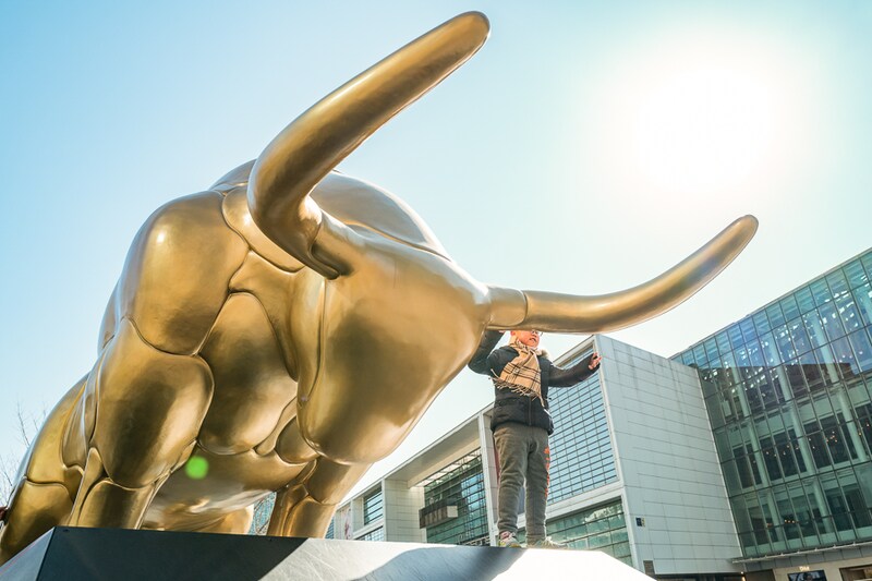 A gold-colored bull statue is seen at Beijing Financial Street on the fifth day of the Chinese New Year, the Year of the Ox, on February 16, 2021 in Beijing, China.