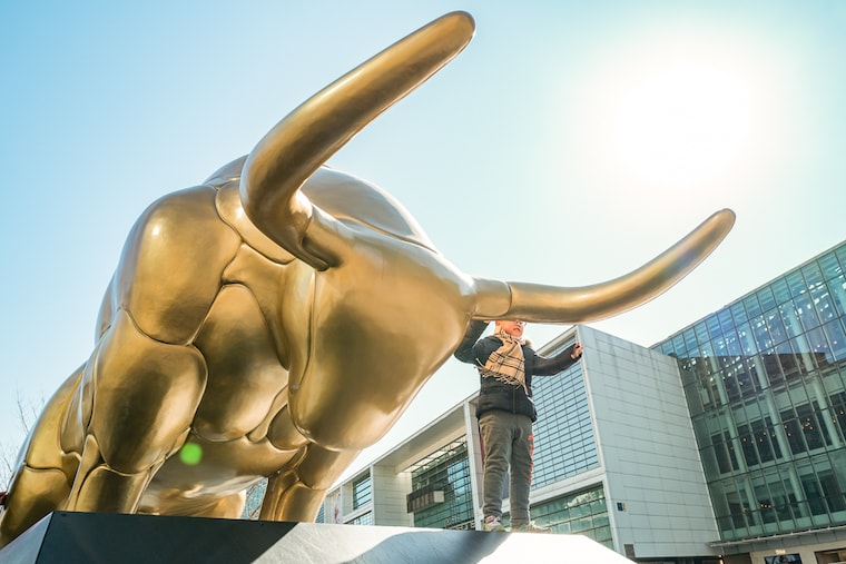 A gold-colored bull statue is seen at Beijing Financial Street on the fifth day of the Chinese New Year, the Year of the Ox, on February 16, 2021 in Beijing, China.
