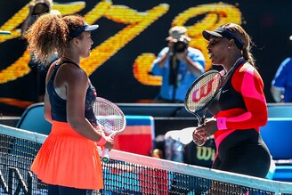 Japan"s Naomi Osaka with Serena Williams of the U.S. after winning their semi final match in Melbourne Park, Melbourne, Australia on February 18, 2021.