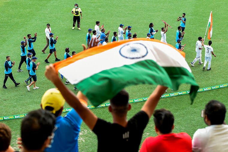 India players and staff parade around the ground during day five of the 4th Test Match in the series between Australia and India at The Gabba on January 19, 2021 in Brisbane, Australia.