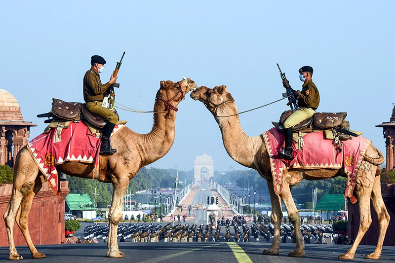 Border Security Force (BSF) camel contingent stands guard at Raisina Hills during the rehearsals for Beating Retreat 2021, at Raisina hill on January 21, 2021 in New Delhi, India.