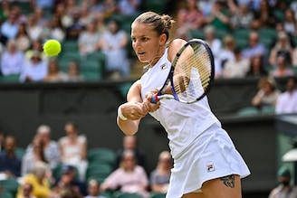 Karolina Pliskova of the Czech Republic hits a backhand against Aryna Sabalenka of Belarus in the semi-finals of the ladies singles during day ten of Wimbledon 2021 at All England Lawn Tennis and Croquet Club on July 08, 2021, in London, England. For her first-ever grand slam final, she faces world number one Ash Barty on Saturday.