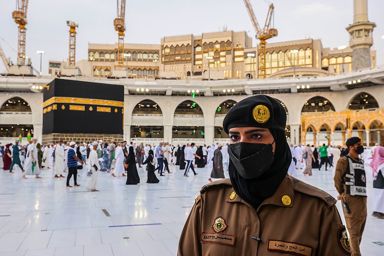 In a first, Saudi women soldiers stand guard in Mecca as pilgrims perform final Tawaf during the annual Haj pilgrimage, in the holy city of Mecca, Saudi Arabia, on July 20, 2021.