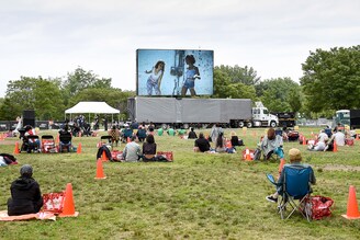Picnic-style screenings for moviebuffs this year at Tribeca Festival 2021"s Borough To Borough Screenings at Soundview Park in the Bronx in New York City on June 12, 2021. Tribeca screenings connect communities across all the five boroughs to share the festival experience safely, while supporting local businesses. The Bronx screenings are hosted by FreshDirect, a leading grocery service in US.