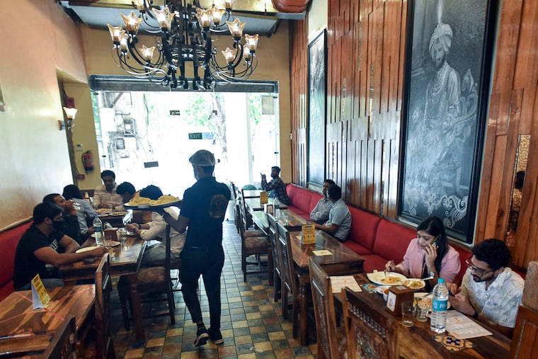 Delhiites overcame hesitancy to step out to restaurants like Sandoz in Connaught Place after Delhi unlocked further on June 14, 2021, allowing restaurants to function with 50% capacity. Restaurant owners were left wondering if it was financially viable for them to say open, given the low footfalls on Day 1, amid apprehensions of another viral wave.