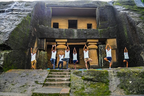 People take part in a yoga session at the Kanheri Caves on the outskirts of Mumbai on June 21, 2021, to mark International Yoga Day.