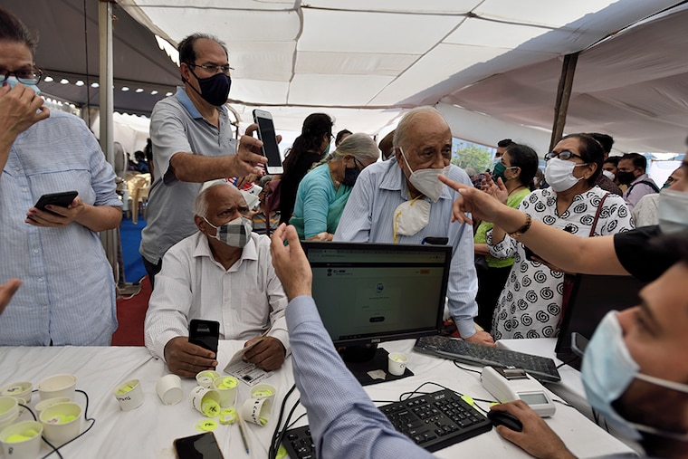 Senior citizen registering to get their first dose of a Covid-19 vaccination, at BKC on March 1, 2021 in Mumbai, India. India"s Covid-19 vaccination drive was extended today to include the elderly and those with co-morbidities.