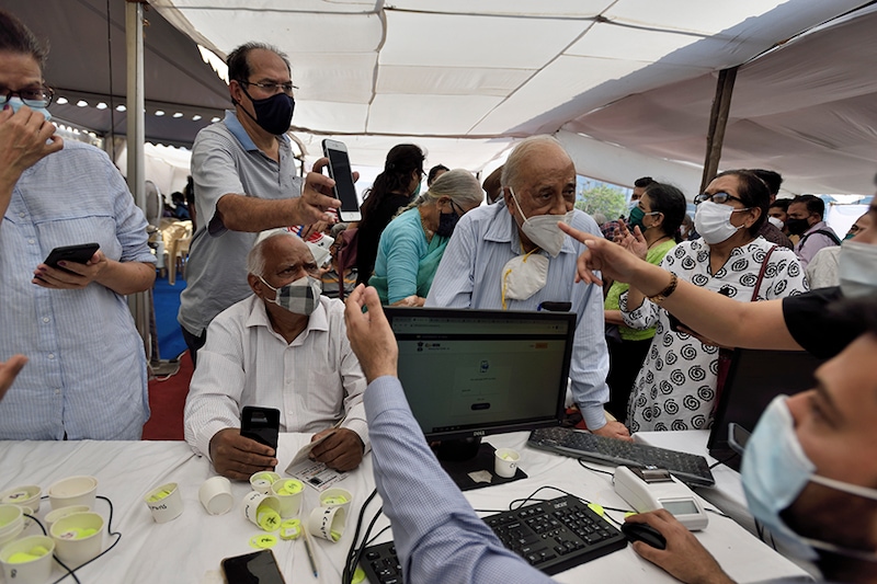 Senior citizen registering to get their first dose of a Covid-19 vaccination, at BKC on March 1, 2021 in Mumbai, India. India"s Covid-19 vaccination drive was extended today to include the elderly and those with co-morbidities.