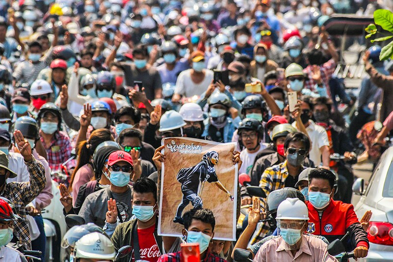 People attend the funeral of Angel, a 19-year-old protester also known as Kyal Sin who was shot in the head as Myanmar forces opened fire to disperse an anti-coup demonstration in Mandalay, Myanmar, March 4, 2021.