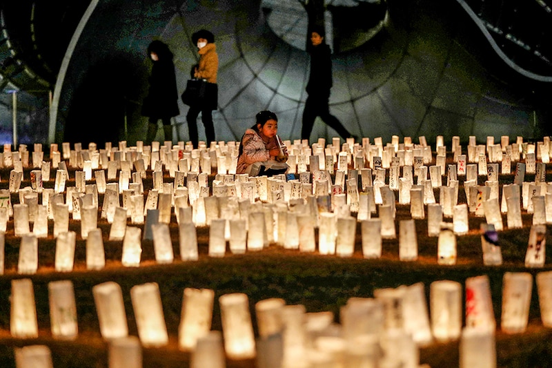 Paper lanterns are lit for the victims of the March 11, 2011 earthquake and tsunami disaster at Fukushima nuclear plant in Japan that killed thousands and triggered the worst nuclear accident since Chernobyl, in Tokyo, Japan, March 11, 2021, to mark the 10th anniversary of the disaster.