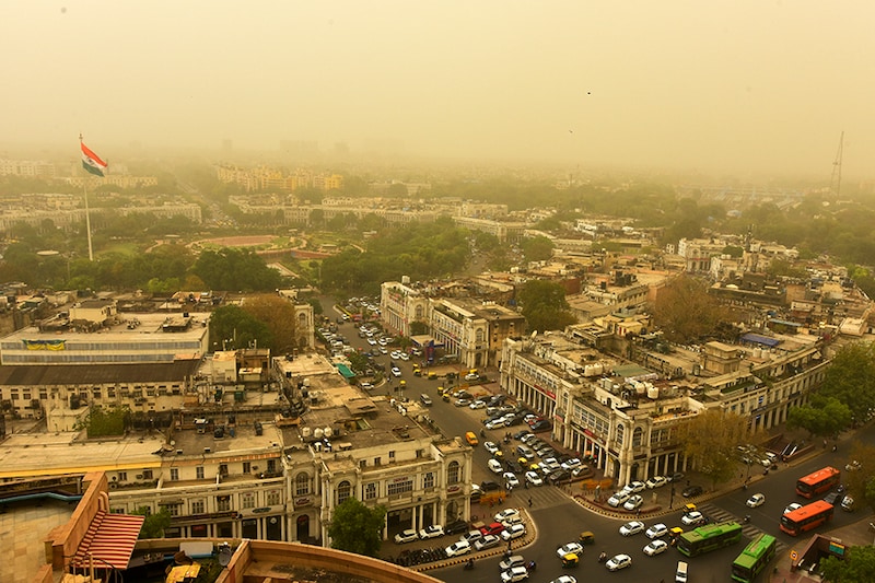 An aerial view of cloudy and dusty weather, at Connaught place on March 30, 2021 in New Delhi, India. A yellowish haze enveloped Delhi NCR as strong dust-raising winds, gusting up to 40 kilometers per hour, swept the region.