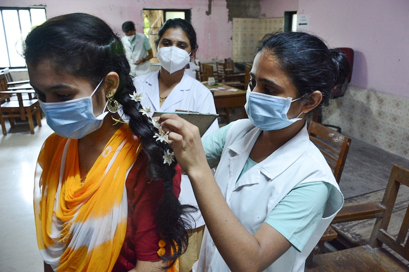 With flowers in braids, nurses pay homage to Florence Nightingale, an icon for nurses worldwide, on her birth anniversary that falls today. The District Nurses" Training Centre in Thane, Mumbai, celebrated Nurses Week from May 7 to May 12, 2021.