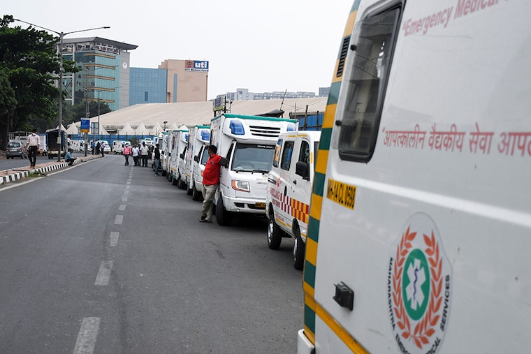 Around 30 ambulances wait outside the makeshift Jumbo Covid-19 hospital at Bandra Kurla Complex to shift patients in the wake of Cyclone Tauktae, which is expected to bring strong winds and rains to Mumbai. The additional municipal commissioner said, "We have asked other hospitals to begin preparations to receive patients from the Jumbo centers. We don’t want last minute confusion over beds, oxygen devices, etc."
