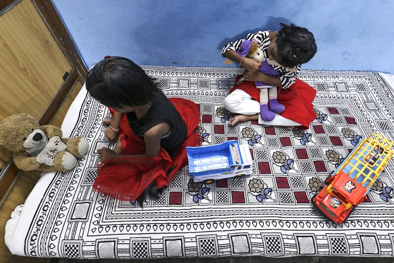 Twin sisters Tripti and Pari, who lost both their parents recently due to the Covid-19 coronavirus, are now housed at a relative"s home in Bhopal. Thousands of children have lost at least one parent in the new pandemic wave ravaging India, a country dealing with a significant number of orphans even before the scourge.