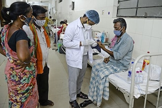 A doctor examines a patient infected with mucormycosis, a deadly fungal infection at a ward of a government hospital in Hyderabad, Telengana. Despite having the maximum vaccine makers in India, Telengana has administered just over 12,300 vaccines over the last eight days, that too in just four of the thirty three districts of the state. With vaccine supply severely restricted, experts are warning of a deluge of infection in the coming days.
