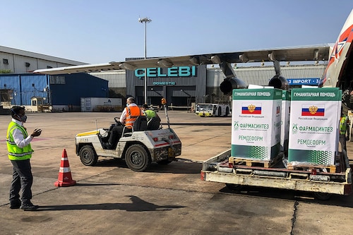 A Russian Emergencies Ministry Ilyushin IL-76 cargo aircraft is unloaded at Indira Gandhi International Airport in New Delhi. The aircraft delivered more than nine tonnes of medication as cases surge in India during the second wave of the novel coronavirus pandemic.