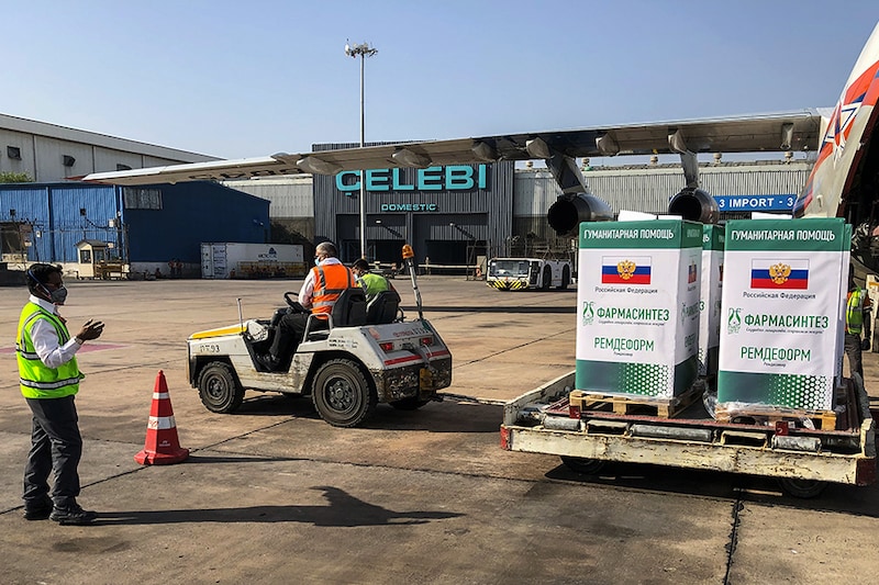 A Russian Emergencies Ministry Ilyushin IL-76 cargo aircraft is unloaded at Indira Gandhi International Airport in New Delhi. The aircraft delivered more than nine tonnes of medication as cases surge in India during the second wave of the novel coronavirus pandemic.