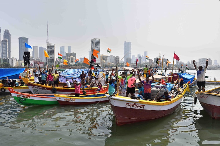Sitting in around 200 fishing boats, Worli fishermen in a Channel Roko agitation protest against the coastal road sealink interchange project at Worli, on October 30, 2021 in Mumbai, India.
