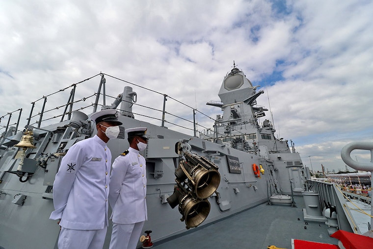 Indian Navy personnel stand guard on the deck of INS Visakhapatnam, the stealth guided-missile destroyer ship of Project 15B, during its commissioning ceremony in Mumbai, India, November 21, 2021.