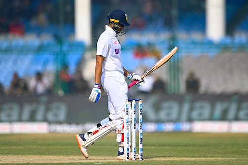 India"s Shubman Gill gestures as he celebrates after scoring a half-century (50 runs) during the first Test cricket match between India and New Zealand at the Green Park Stadium in Kanpur on November 25, 2021.