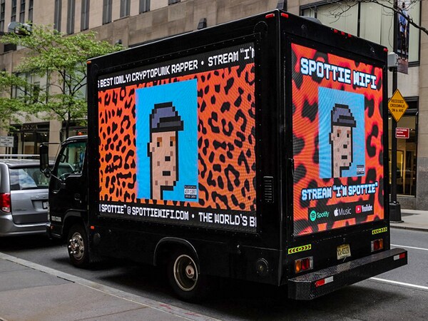 A truck parked outside of Christie"s auction house displays a CryptoPunk digital art non-fungible token (NFT) on electronic billboards in New York City. Image: Dia Dipasupil / Getty Images North America / Getty Images via AFP