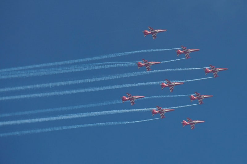 The Surya Kiran Aerobatic Team (SKAT) flies during an air show to mark the 50th Anniversary of India"s victory in the Indo-Pakistani War of 1971, in Jalandhar on September 18, 2021.
