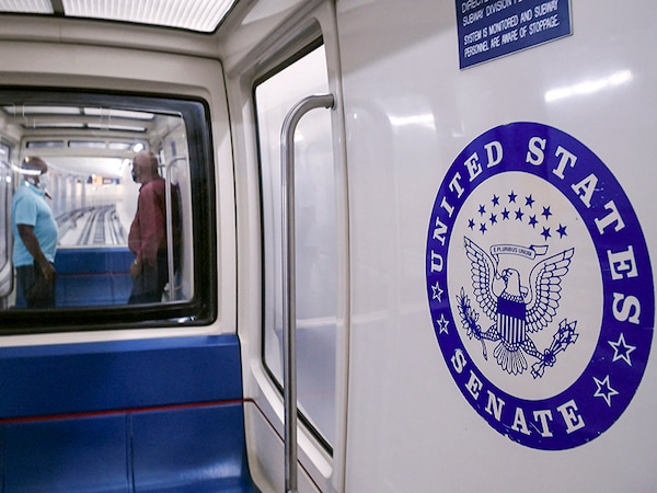 Capitol Hill staffers are seen on a subway car at the US Capitol Image: Olivier Douliery / AFP