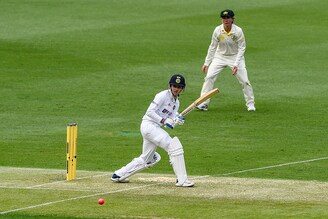 Smriti Mandhana bats during Day 1 of the Women"s International Pink-Ball Test match between Australia and India at Metricon Stadium on September 30, 2021 in Gold Coast, Australia. Mandhana is unbeaten on 70 runs while play halted due to bad weather.